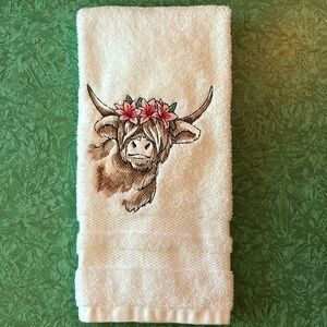 Adorable cow with the flower crown hand towel